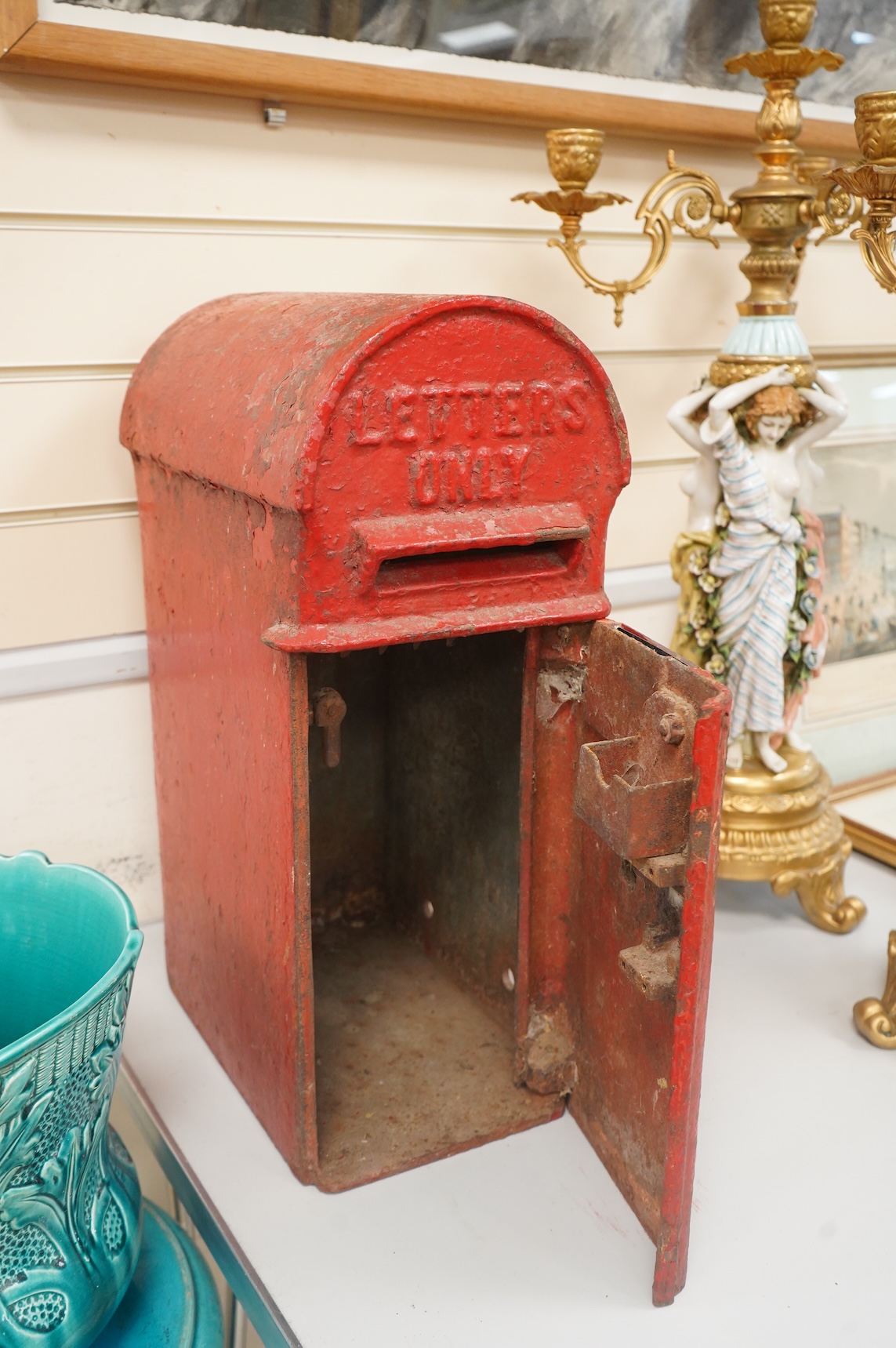 A Handyside & Co. George V red painted iron domed topped wall/post mounting post box, height 50.cm high x 19cm wide